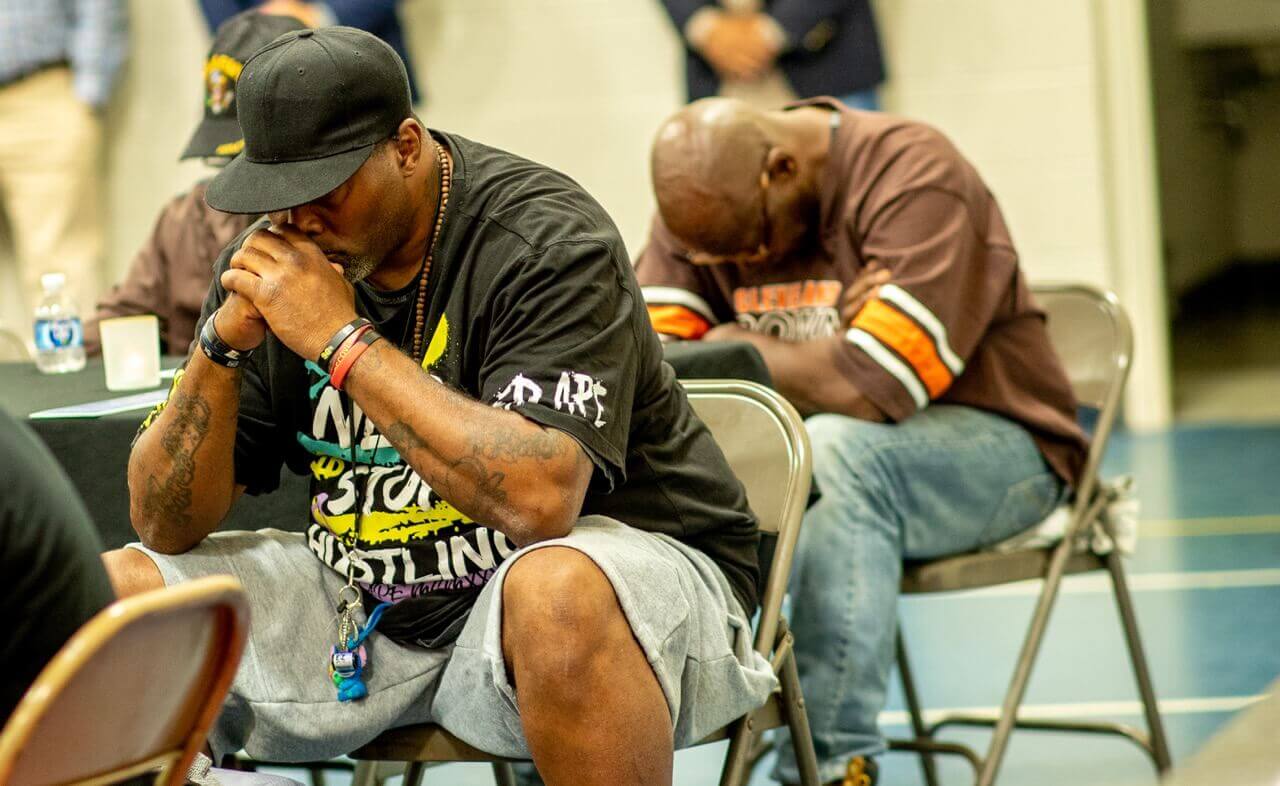 Men Praying at Crossroads The City Mission Cleveland